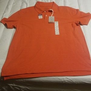 This is a new with tags st. John's bay orange polo